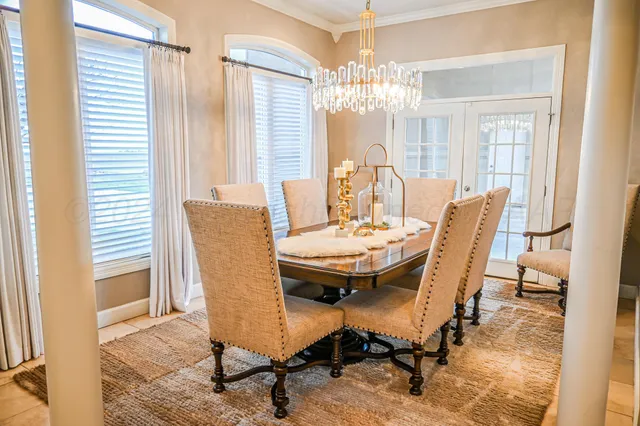 a view of walk in closet with clothes