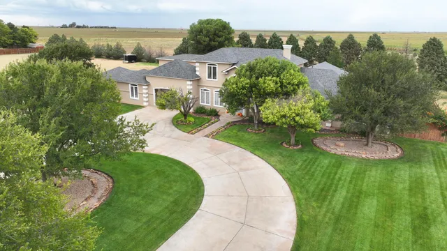a view of backyard with green space