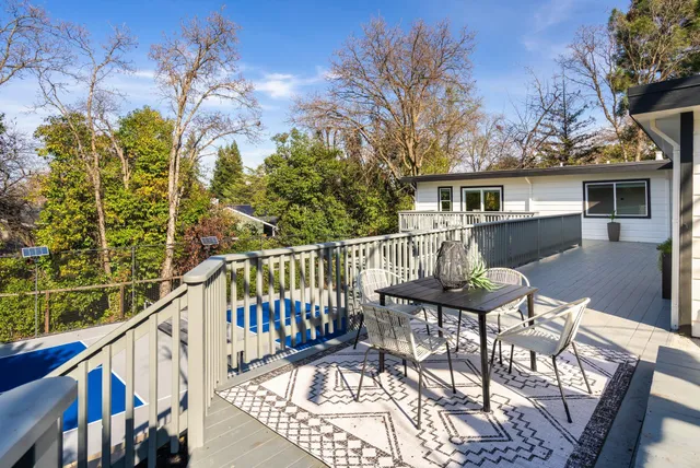a view of swimming pool with a yard