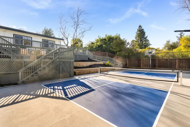 a view of a swimming pool with an outdoor space