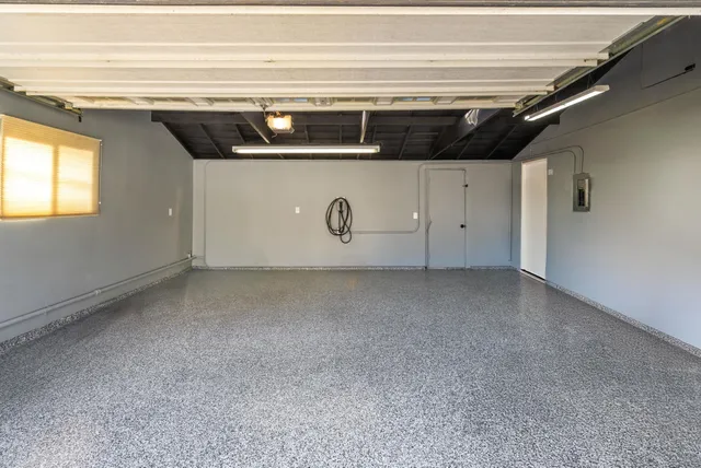 a view of a house with a street