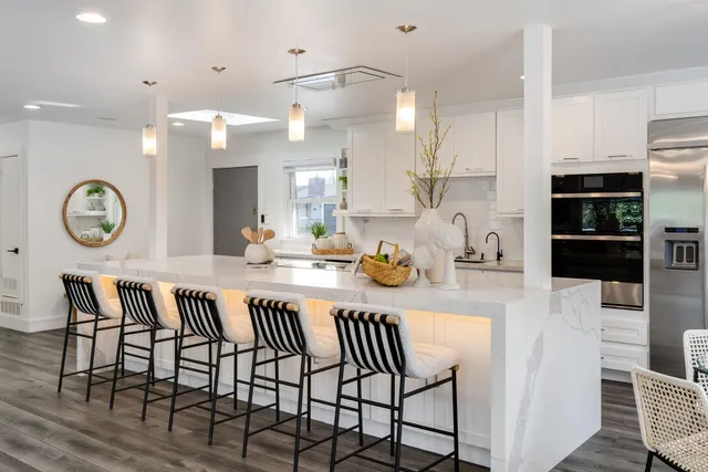 a kitchen with a table and chairs in it