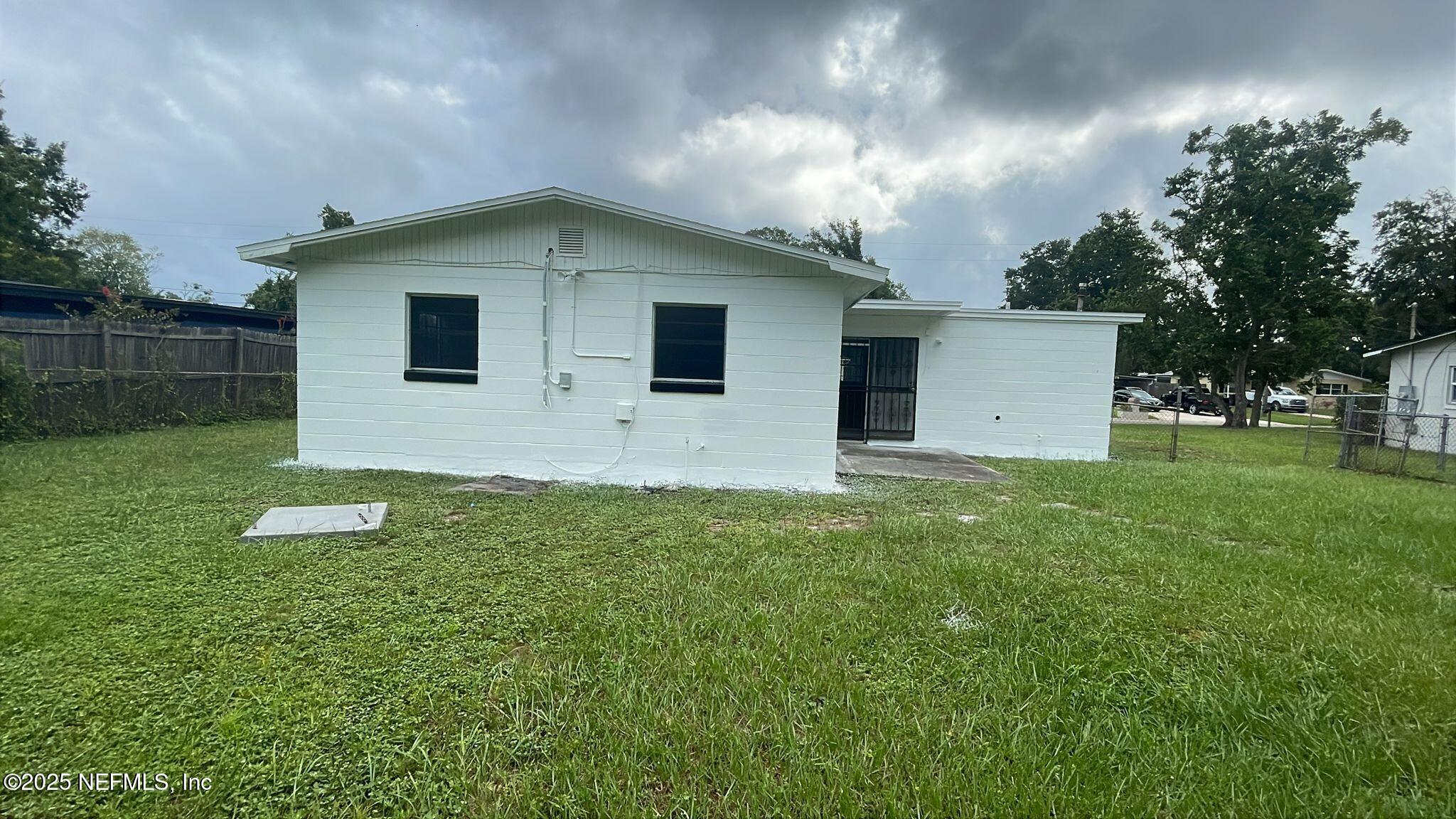 9504 Flechette Avenue Jacksonville, FL 32208 - Photo 13 of 14 a house view with backyard space