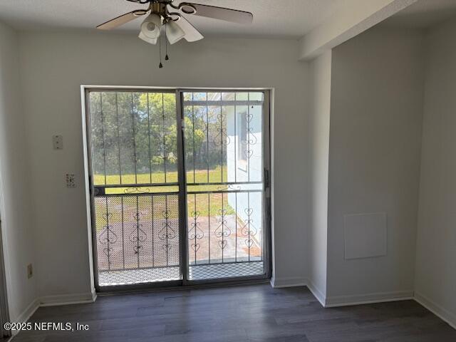 9504 Flechette Avenue Jacksonville, FL 32208 - Photo 7 of 14 a view of front door with wooden floor