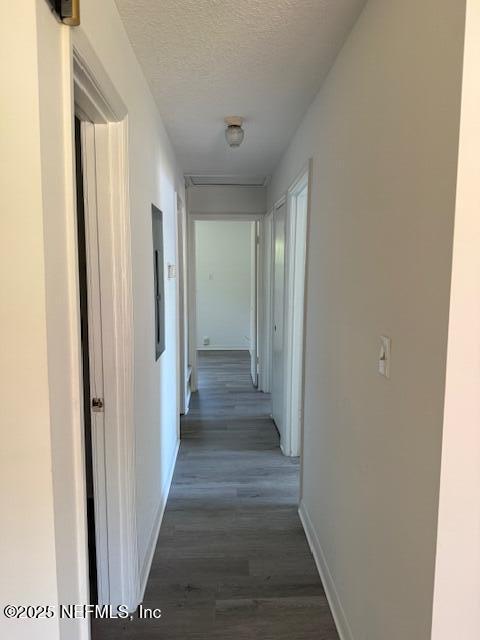 9504 Flechette Avenue Jacksonville, FL 32208 - Photo 8 of 14 a view of a hallway with wooden floor