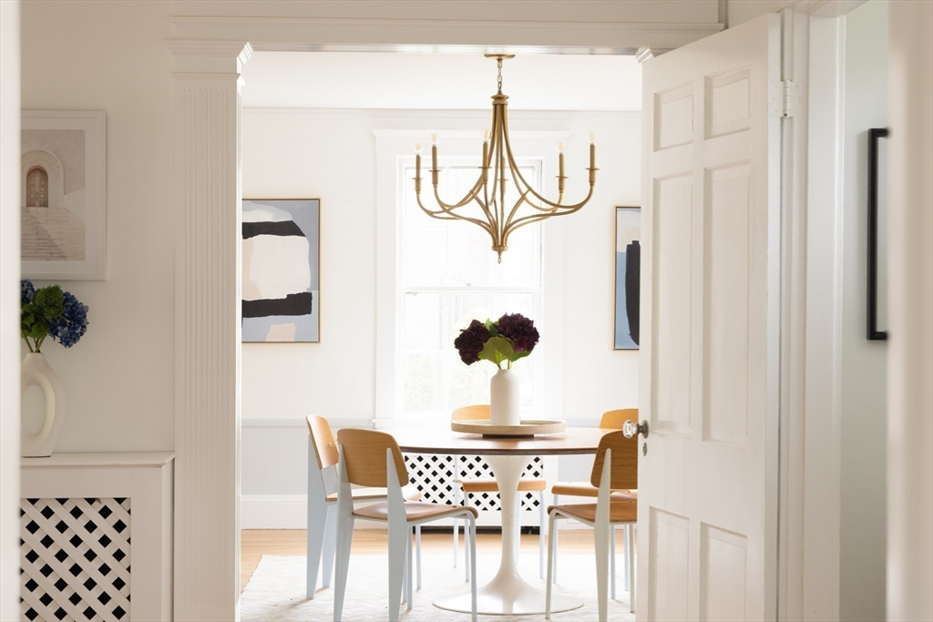 37 Randolph Road Brookline, MA 02467 - Photo 7 of 20 a view of a dining room with furniture and wooden floor