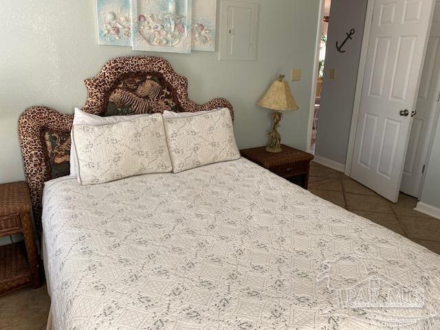 16590 Perdido Key Drive, Unit 5A Perdido Key, FL 32507 - Photo 11 of 24 a bedroom with a bed and a couch