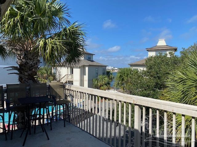 16590 Perdido Key Drive, Unit 5A Perdido Key, FL 32507 - Photo 16 of 24 a view of a balcony with potted plants