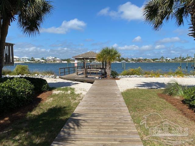16590 Perdido Key Drive, Unit 5A Perdido Key, FL 32507 - Photo 18 of 24 a view of a lake with a garden
