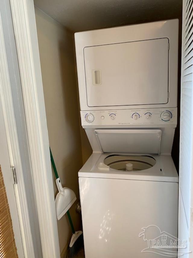 16590 Perdido Key Drive, Unit 5A Perdido Key, FL 32507 - Photo 21 of 24 a utility room with dryer and washer