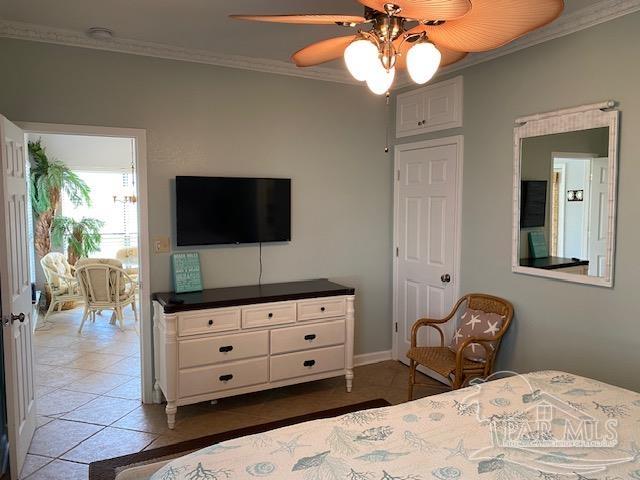 16590 Perdido Key Drive, Unit 5A Perdido Key, FL 32507 - Photo 5 of 24 a bedroom with a bed and flat screen tv