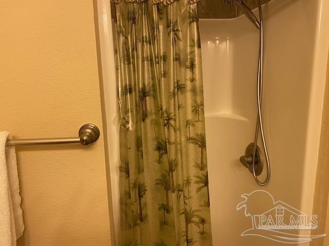 16590 Perdido Key Drive, Unit 5A Perdido Key, FL 32507 - Photo 9 of 24 a bathroom with a shower