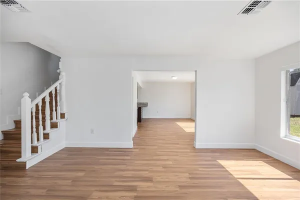 a view of an empty room and window