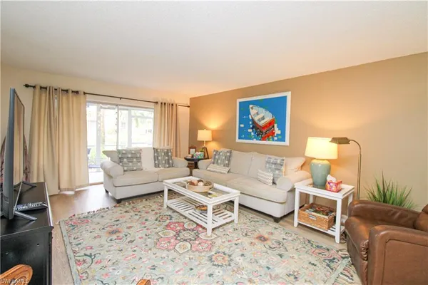 a living room with furniture and a couch