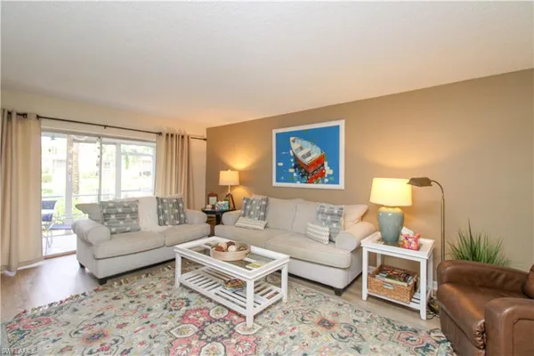 a living room with furniture and a couch