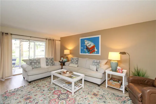 a living room with furniture and a couch