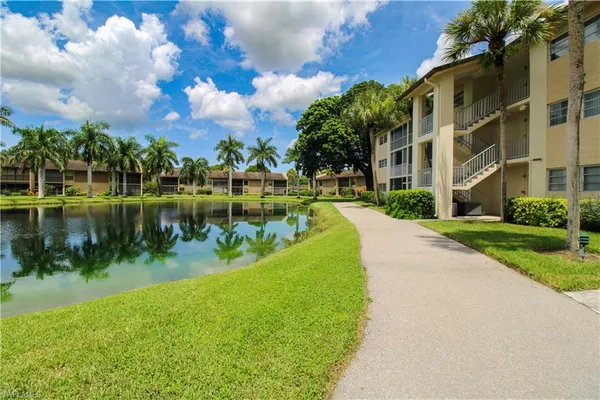 a view of a lake with a building in front of it
