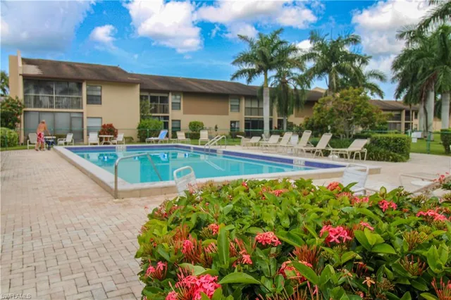 a view of a house with swimming pool