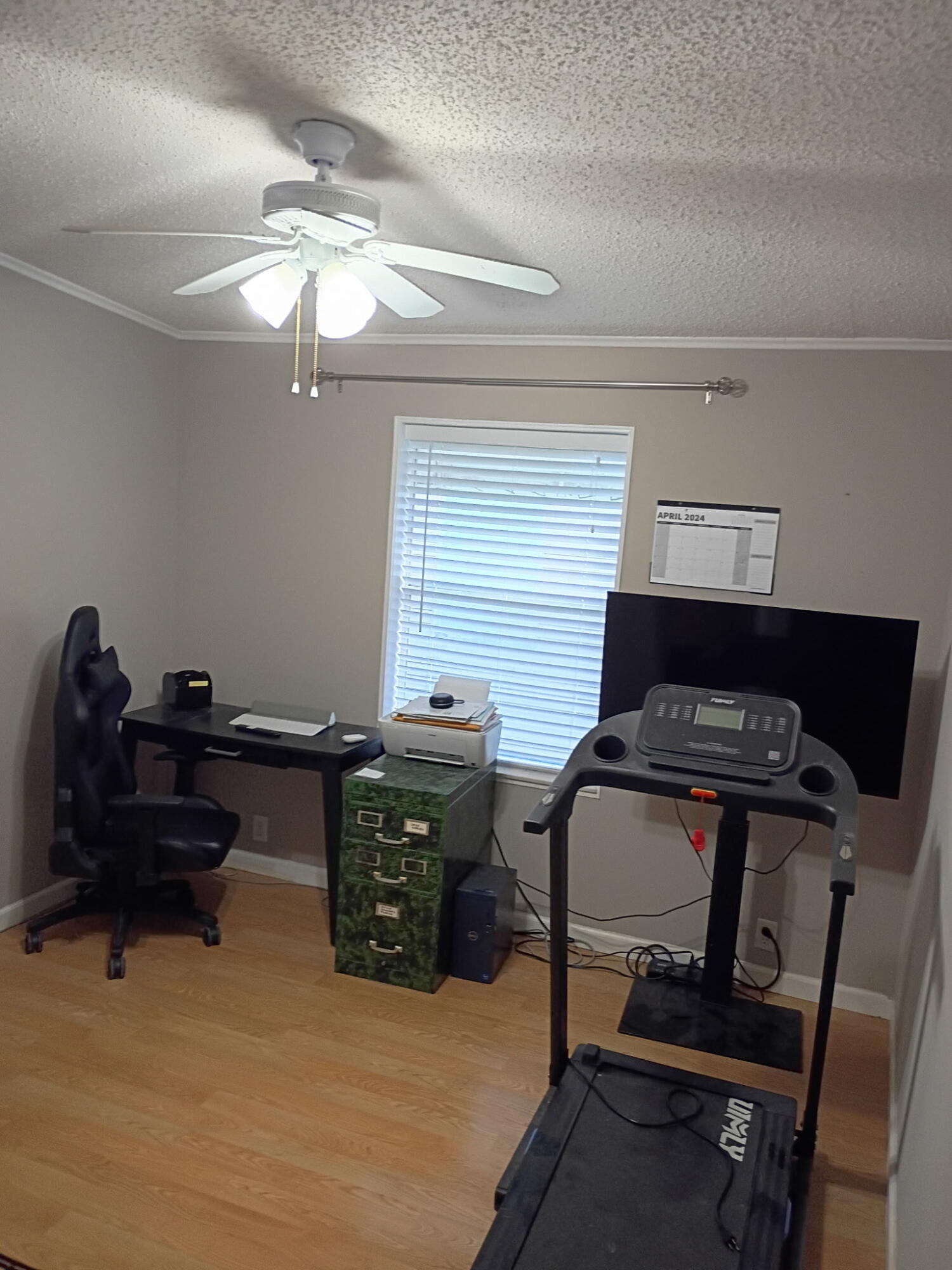 6567 Northwest 34th Avenue Pompano Beach, FL 33073 - Photo 23 of 30 a living room with furniture a piano and a flat screen tv