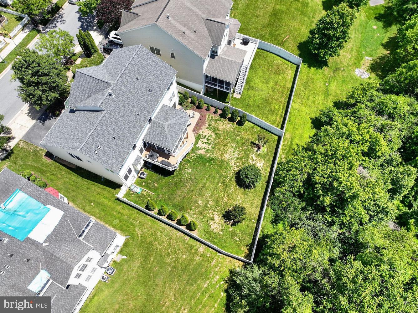 23106 Birch Mead Road Clarksburg, MD 20871 - Photo 48 of 60 an aerial view of a house with pool and garden
