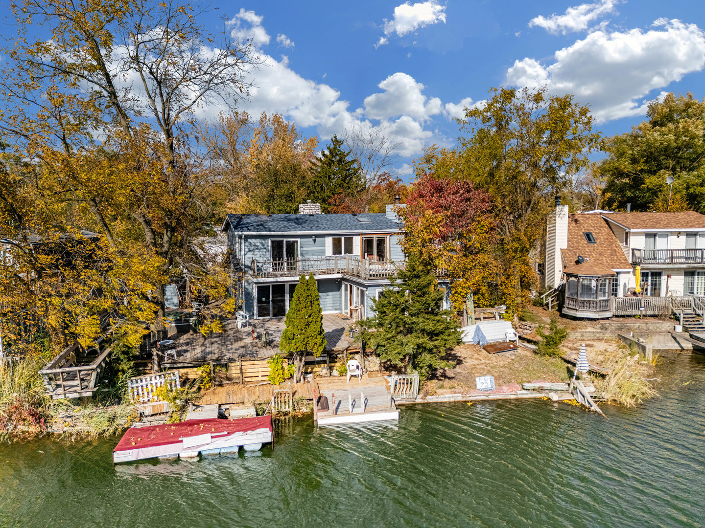 72 Largemouth Lane Wilmington, IL 60481 - Photo 27 of 34 a aerial view of a house with swimming pool lawn chairs and a fire pit