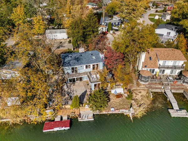 an aerial view of residential house with outdoor space