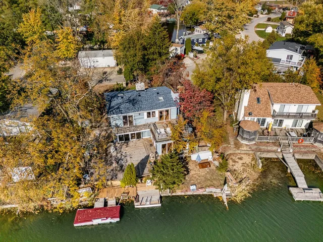 an aerial view of residential house with outdoor space
