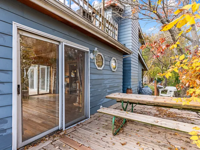a view of a bench in front of building