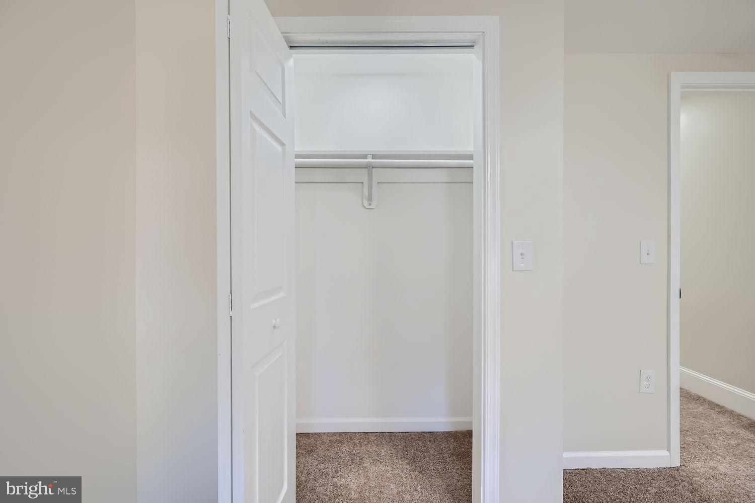 1147 Scott Street Baltimore, MD 21230 - Photo 21 of 28 a view of walk in closet with empty racks