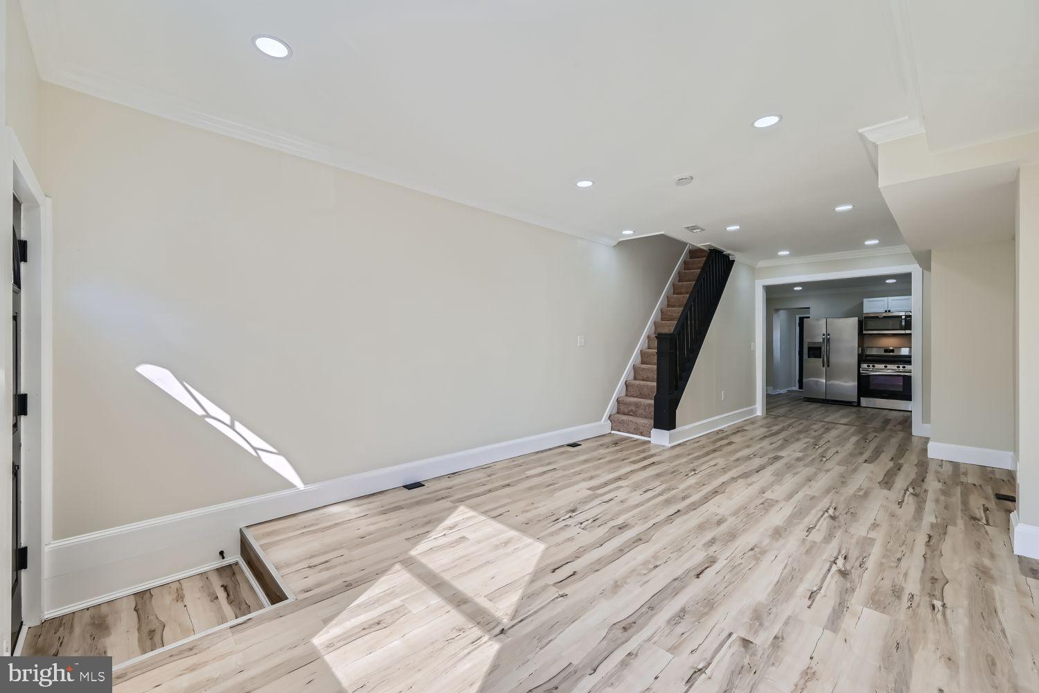 1147 Scott Street Baltimore, MD 21230 - Photo 4 of 28 a view of a hallway with stairs