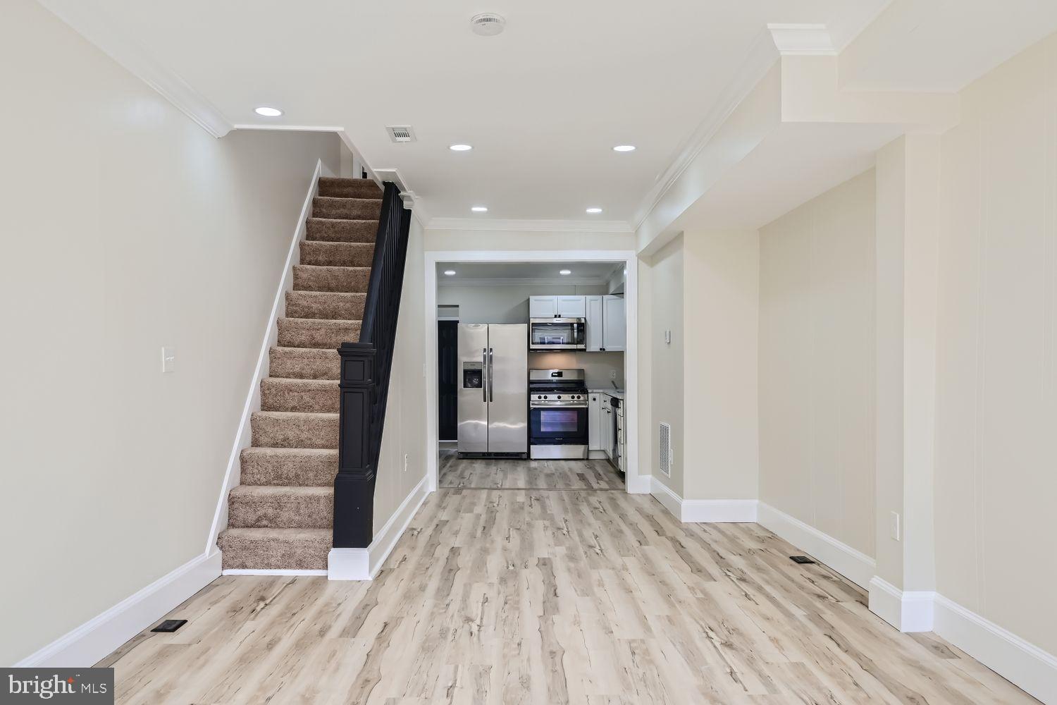 1147 Scott Street Baltimore, MD 21230 - Photo 6 of 28 a view of a hallway with wooden floor and entryway