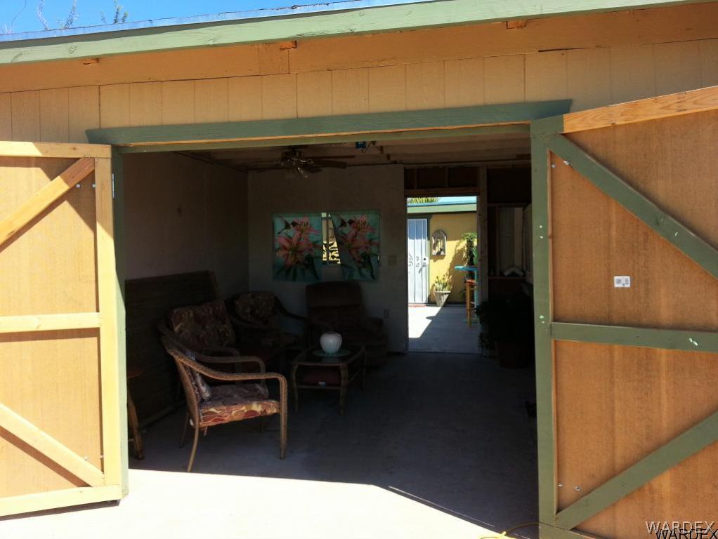 4053 Drake Road Golden Valley, AZ 86413 - Photo 8 of 26 Enclosed patio