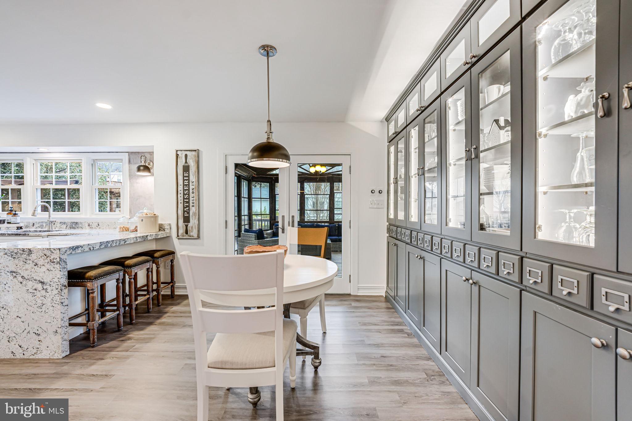 107 Country Road Sterling, VA 20165 - Photo 21 of 58 a view of a dining room with furniture window and wooden floor