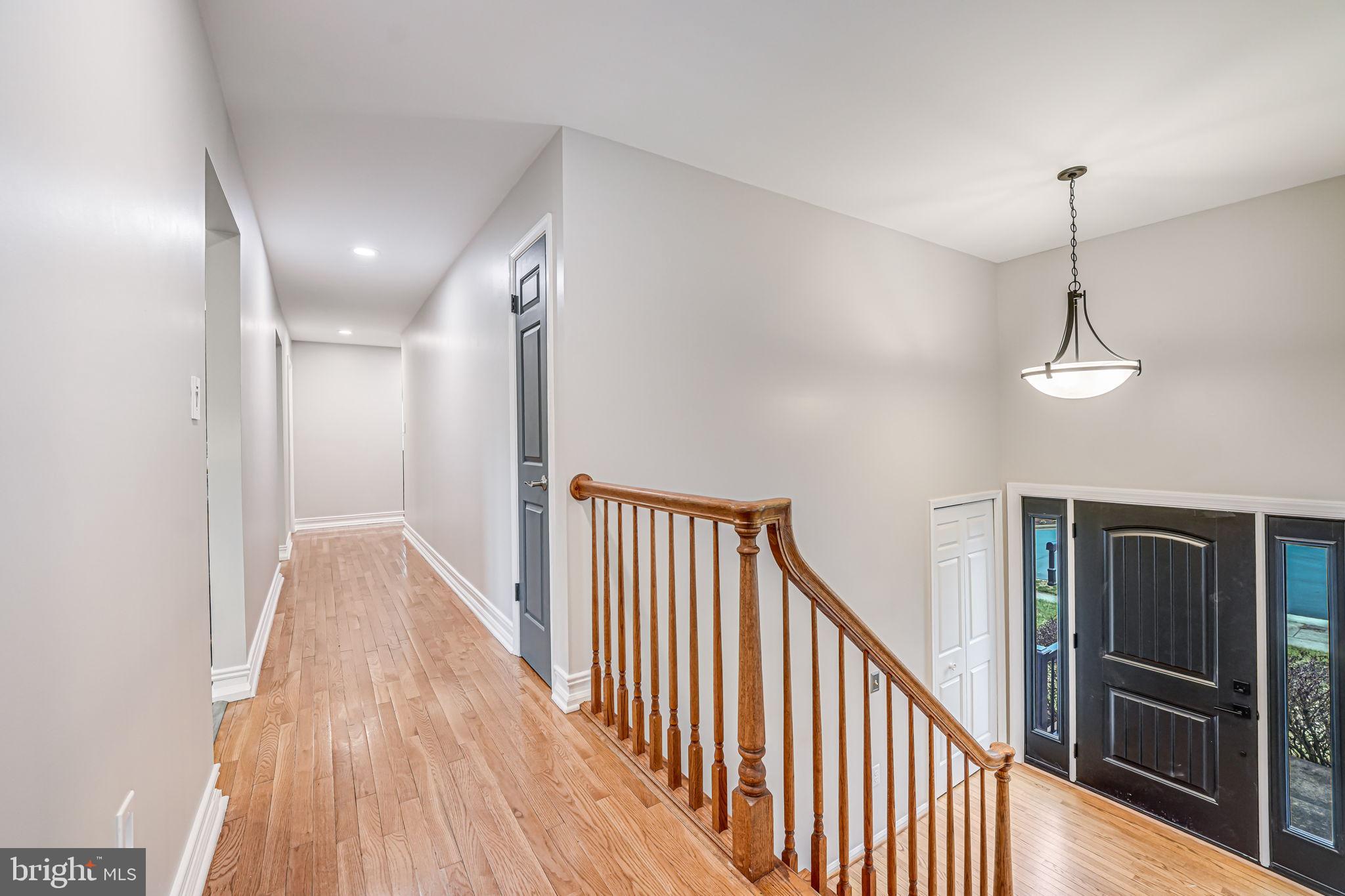 107 Country Road Sterling, VA 20165 - Photo 22 of 58 a view of hallway with stairs