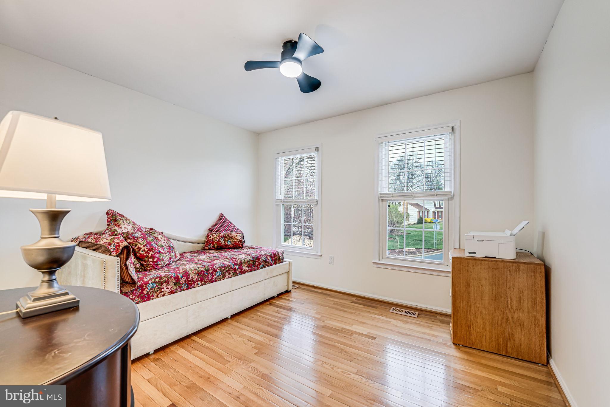 107 Country Road Sterling, VA 20165 - Photo 30 of 58 a living room with furniture and a window