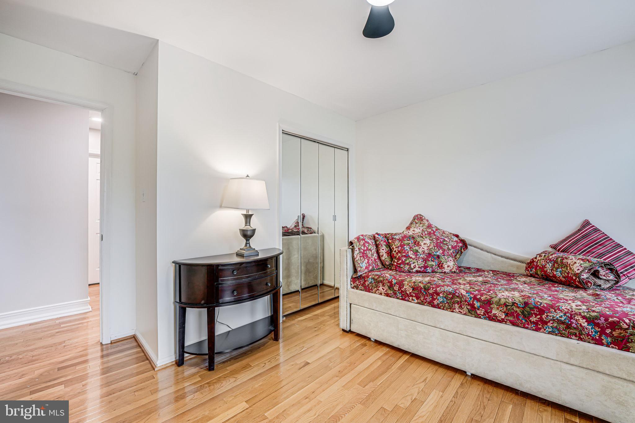 107 Country Road Sterling, VA 20165 - Photo 31 of 58 a living room with furniture and wooden floor