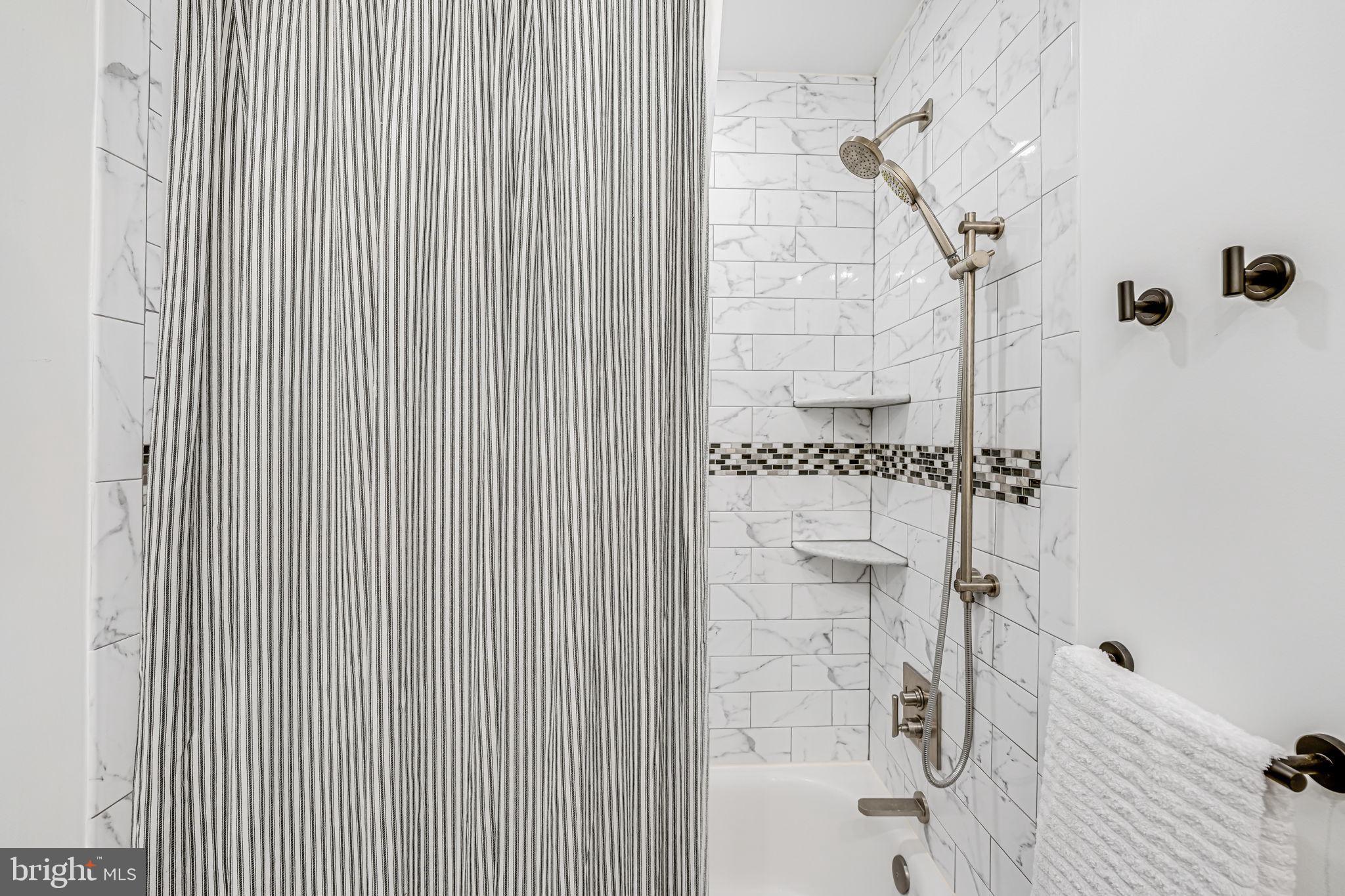 107 Country Road Sterling, VA 20165 - Photo 33 of 58 a bathroom with a shower