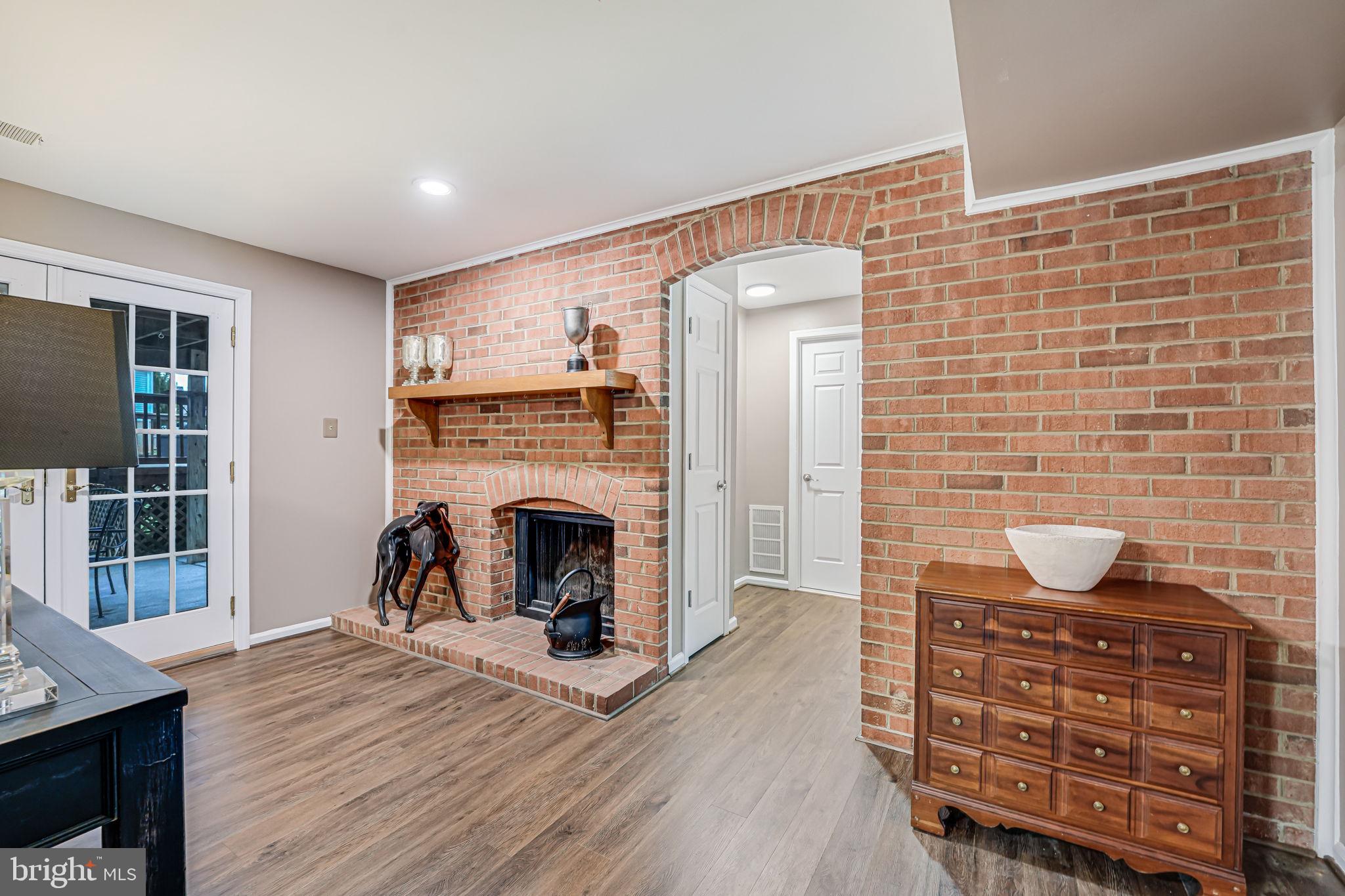 107 Country Road Sterling, VA 20165 - Photo 37 of 58 a view of livingroom with furniture and a fireplace
