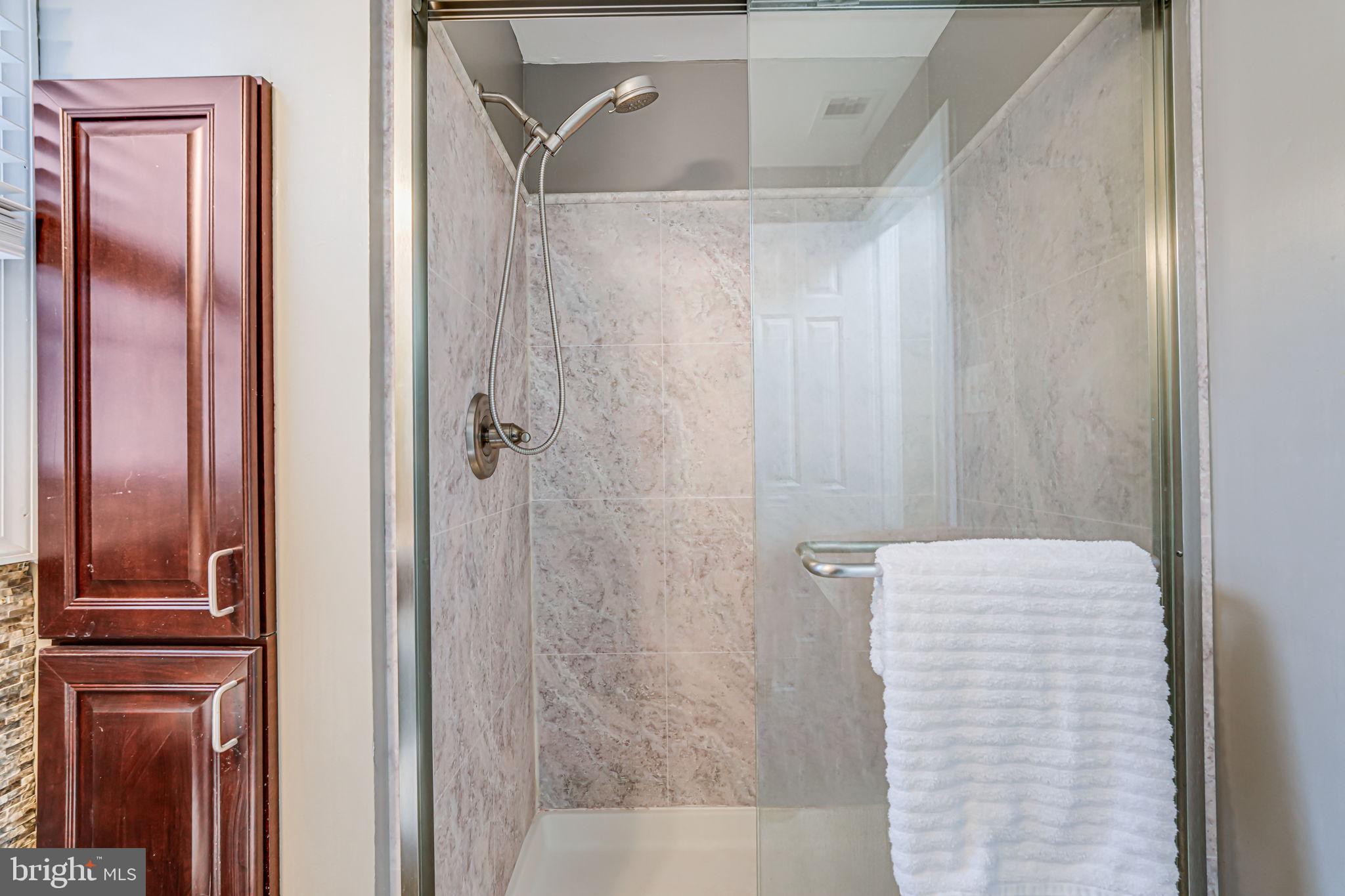 107 Country Road Sterling, VA 20165 - Photo 40 of 58 a bathroom with a shower