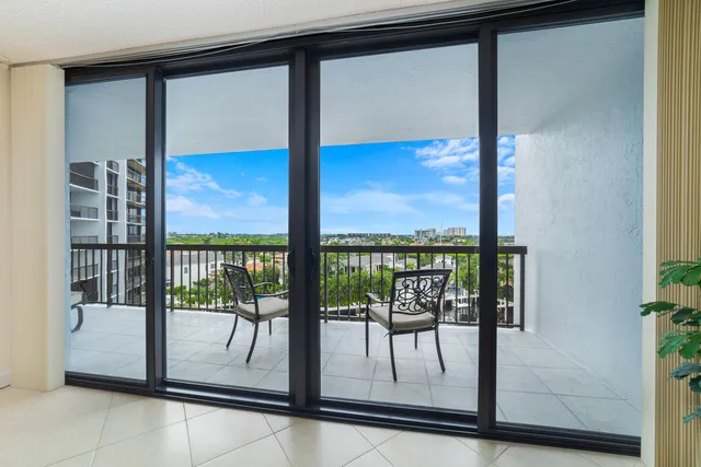 a view of a room with a large window