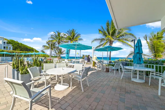 a view of balcony with furniture