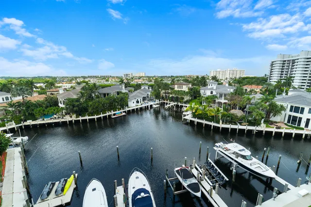 an aerial view of a house with a ocean view