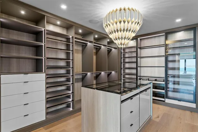 a view of entryway livingroom and hall with wooden floor