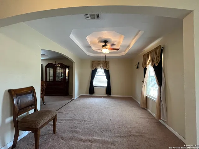 a view of a dining room with furniture