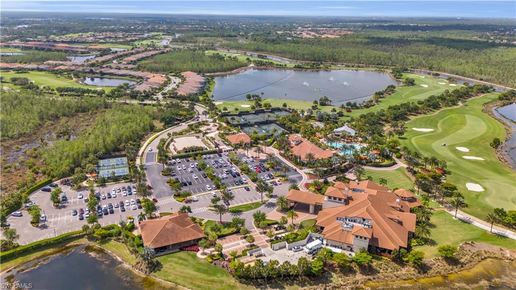 8665 Dilillo Court Naples, FL 34119 - Photo 36 of 42 an aerial view of residential houses with outdoor space