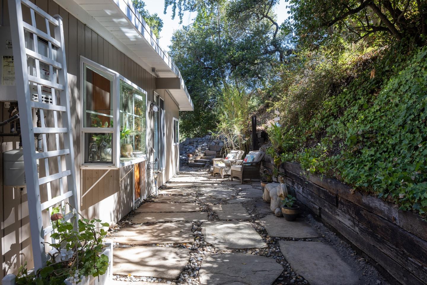 32 Southbank Road Carmel Valley, CA 93924 - Photo 11 of 21 a view of a house with a yard and sitting area