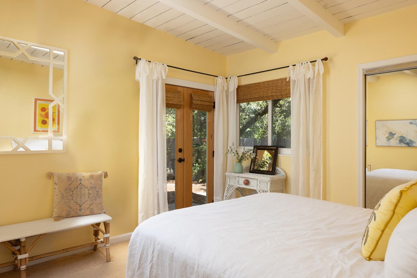 32 Southbank Road Carmel Valley, CA 93924 - Photo 16 of 21 a bedroom with a bed and wooden floor