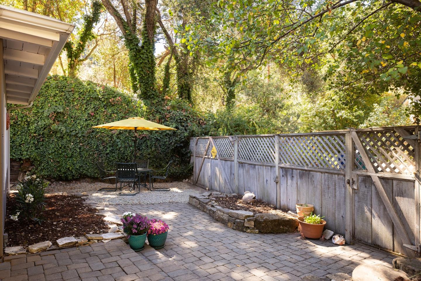 32 Southbank Road Carmel Valley, CA 93924 - Photo 19 of 21 a backyard view with a seating space
