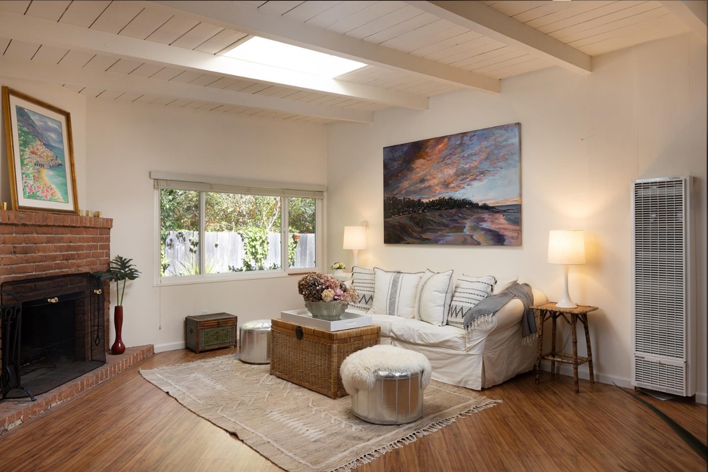 32 Southbank Road Carmel Valley, CA 93924 - Photo 3 of 21 a living room with furniture and a fireplace