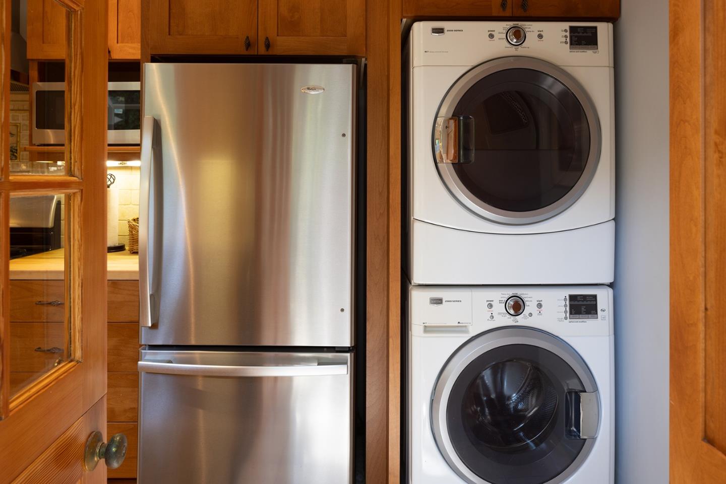 32 Southbank Road Carmel Valley, CA 93924 - Photo 10 of 21 a view of a hallway with washer and dryer